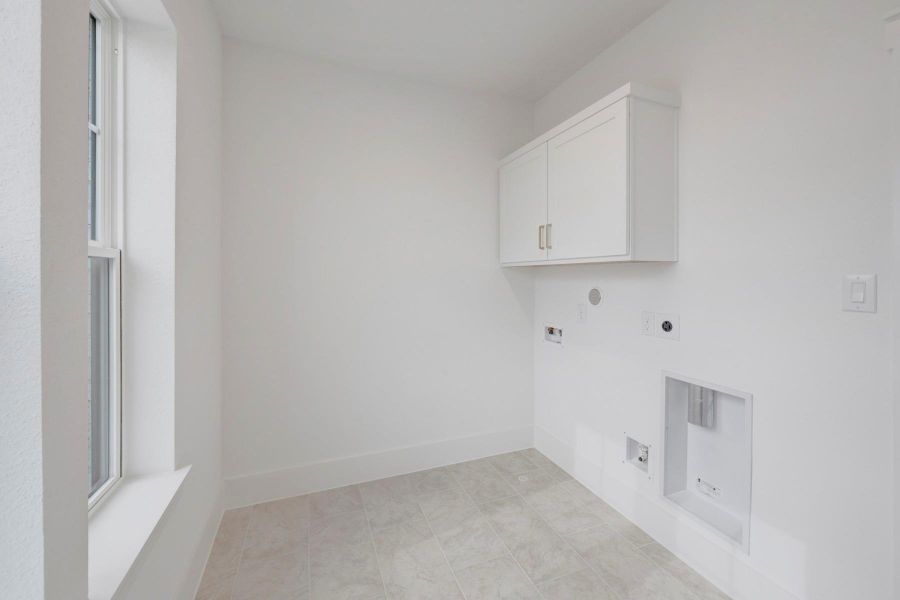 Spacious, unfurnished interior of a new home in Easthaven at Bridgeland Central - Vision Collection, Cypress (Image 25).