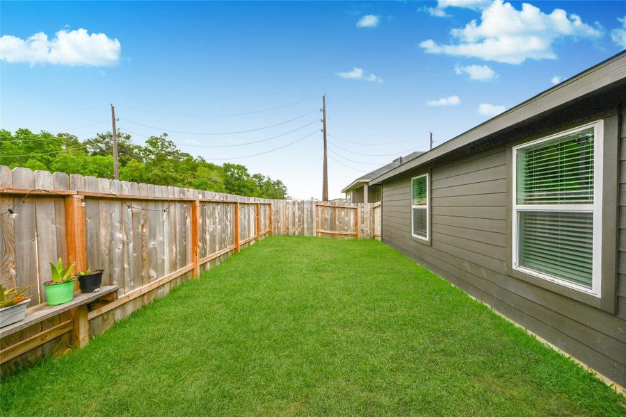 Exterior details and patio area of a home in , Houston (Image 4).