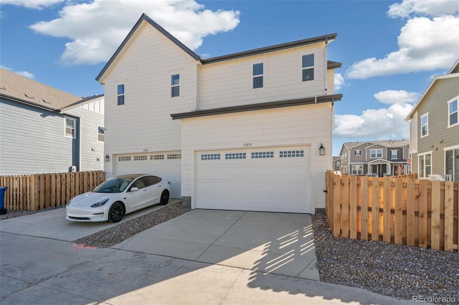 Exterior details and patio area of a home in Turnberry Villas, Commerce City (Image 3).