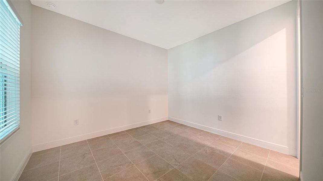 Spacious, unfurnished interior of a new home in Windward Real Estate and Homes for Sale in Sarasota, FL - Neal Communities, Lakewood Ranch (Image 35).