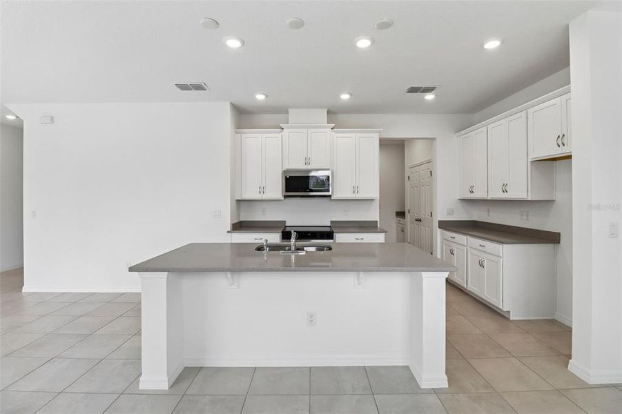 Furnished interior view inside a new home in Beresford Woods, Deland (Image 4).