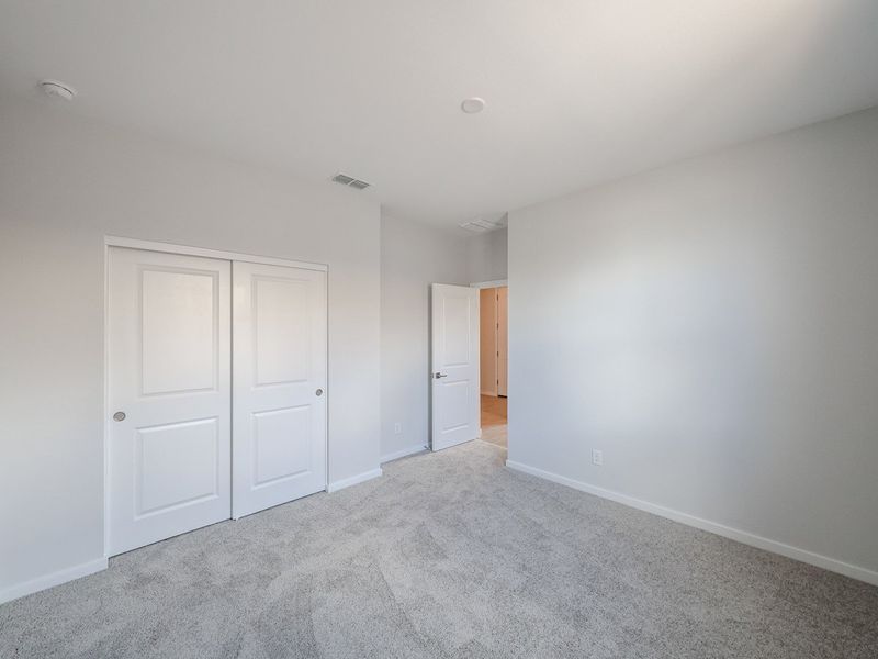 A room with white doors.