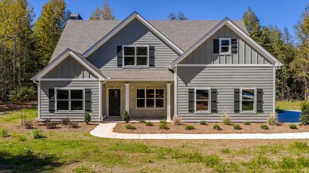 Front exterior of a new home in Collier Grove, Thomaston, GA, highlighting curb appeal (Image 1).
