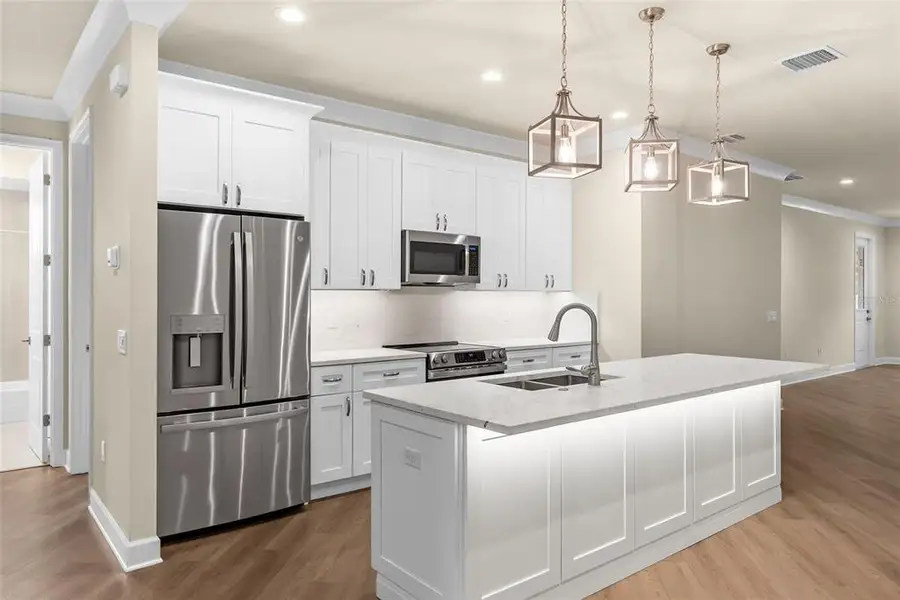 Furnished interior view inside a new home in , Tarpon Springs (Image 13).
