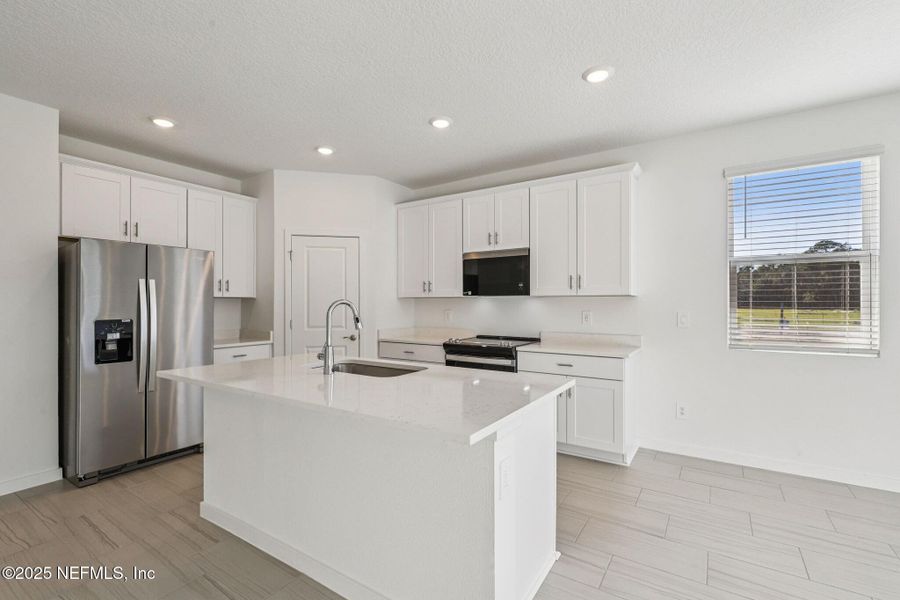 Furnished interior view inside a new home in Cypress Meadows - Signature Series, Jacksonville (Image 3).