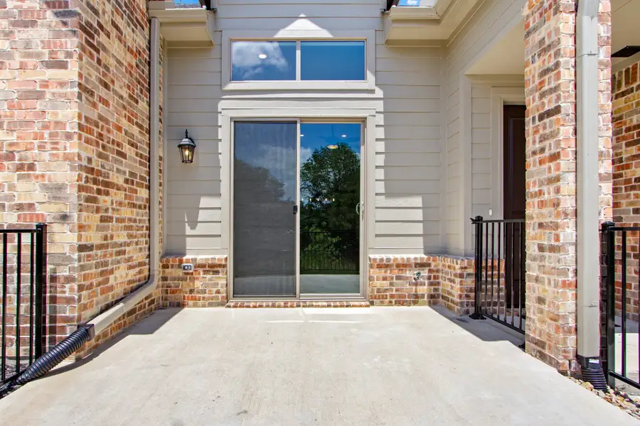Exterior details and patio area of a home in Cottonwood Creek, Rowlett (Image 2). Exterior details and patio area of a home in Cottonwood Creek, Rowlett (Image 2).