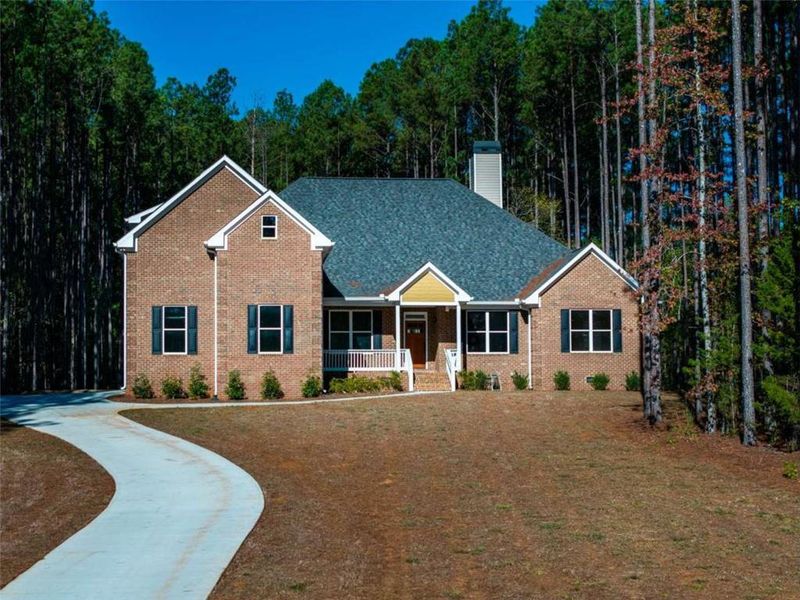 Front exterior of a new home in , Mansfield, GA, highlighting curb appeal (Image 28).