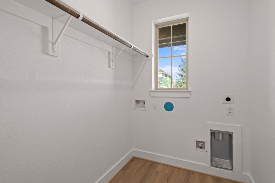 Whether you're sorting through the week’s clothes or prepping for a family gathering, this laundry room is designed to be a cheerful and functional part of your home, where every wash feels like a fresh start. Whether you're sorting through the week’s clothes or prepping for a family gathering, this laundry room is designed to be a cheerful and functional part of your home, where every wash feels like a fresh start.