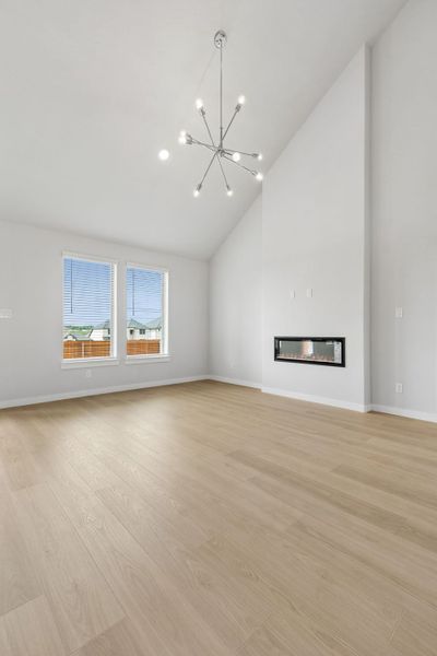 Living Room in the Winters home plan by Trophy Signature Homes – REPRESENTATIVE PHOTO