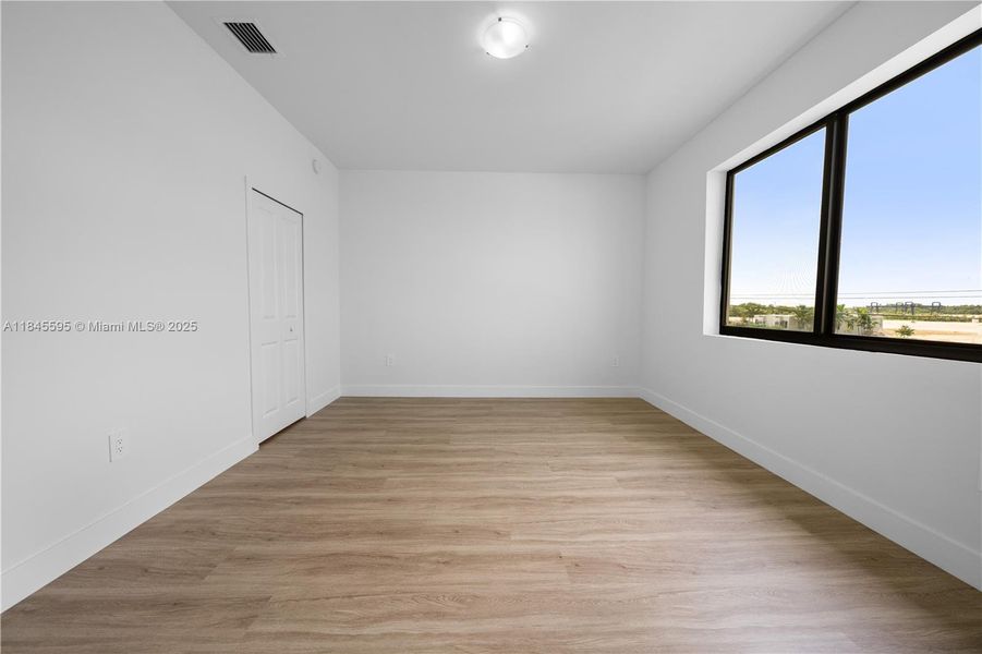 Spacious, unfurnished interior of a new home in , Florida City (Image 32).