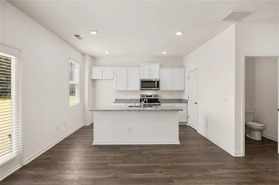Furnished interior view inside a new home in Champion's Run, Lithonia (Image 5).