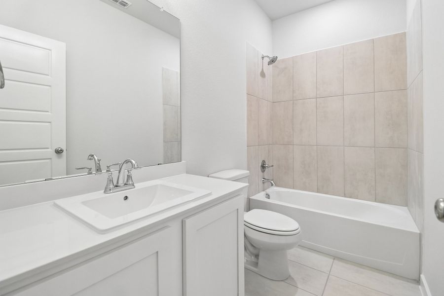 Secondary Bathroom in the Masters home plan by Trophy Signature Homes