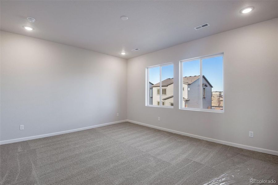 Spacious, unfurnished interior of a new home in Medley at Reunion Ridge, Commerce City (Image 24).