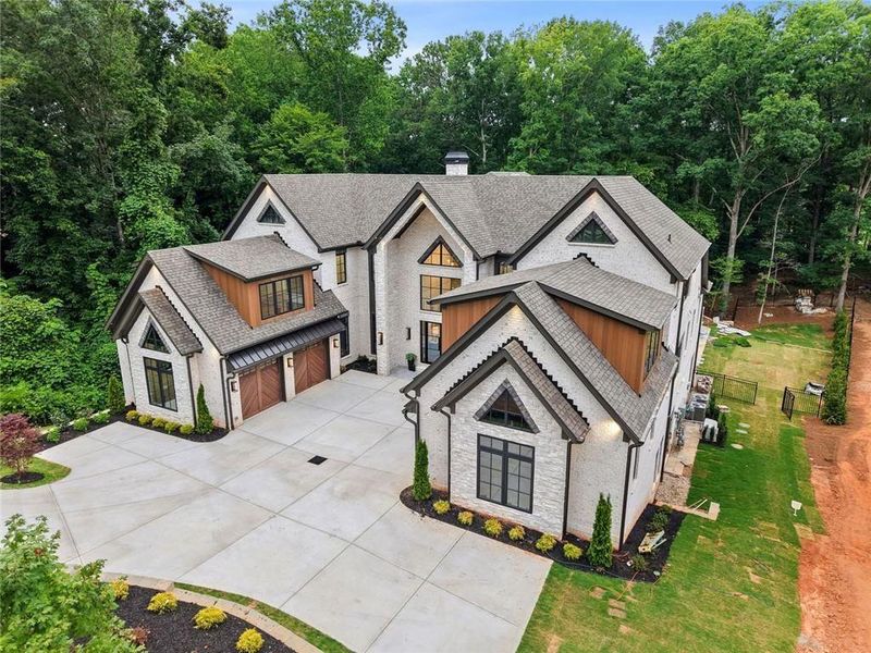 Front exterior of a new home in , Alpharetta, GA, highlighting curb appeal (Image 37). Front exterior of a new home in , Alpharetta, GA, highlighting curb appeal (Image 37).