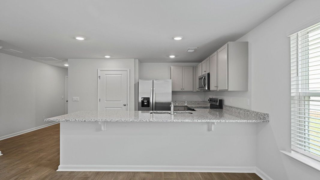 Furnished interior view inside a new home in Center Pointe, Santee (Image 10).