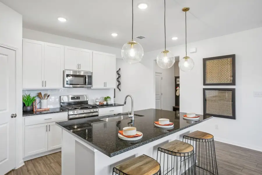Representative furnished interior of a home built from the Sparrow by Taylor Morrison in Longview, Del Valle (Image 5).