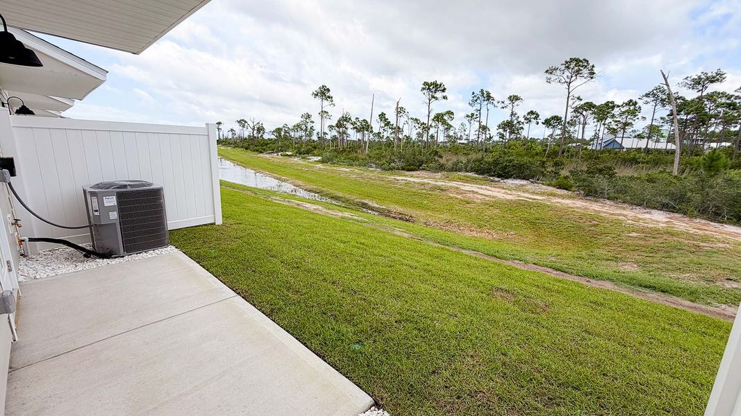 Exterior details and patio area of a home in WindMark Beach, Port Saint Joe (Image 21).
