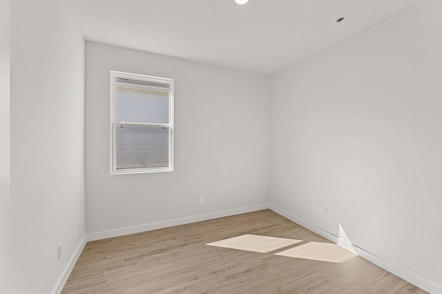 Representative unfurnished interior of a home built from the Clovis by Hakes Brothers in Hunters Ranch, San Antonio (Image 23).