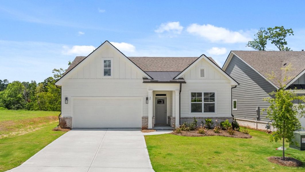 Representative exterior photo of a completed home built from the CLAIBORNE by D.R. Horton in Hamptons at Riverwood North, Dallas, GA (Image 1).