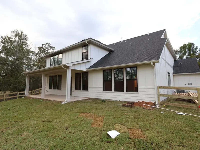 Exterior details and patio area of a home in The Oaks on 6th Street, Magnolia (Image 4). Exterior details and patio area of a home in The Oaks on 6th Street, Magnolia (Image 4).