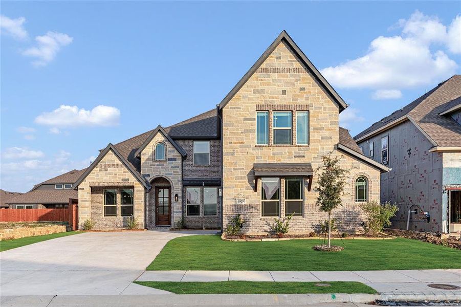 Front exterior of a new home in Country Lakes Classic 60, Argyle, TX, highlighting curb appeal (Image 20).