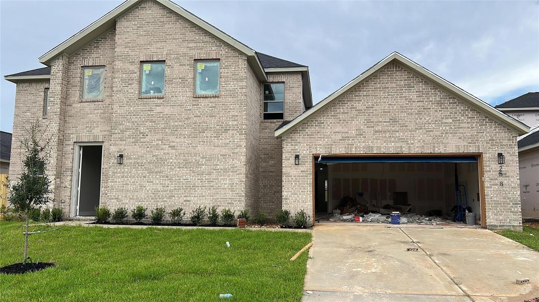 Front exterior of a new home in , Spring, TX, highlighting curb appeal (Image 1). Front exterior of a new home in , Spring, TX, highlighting curb appeal (Image 1).