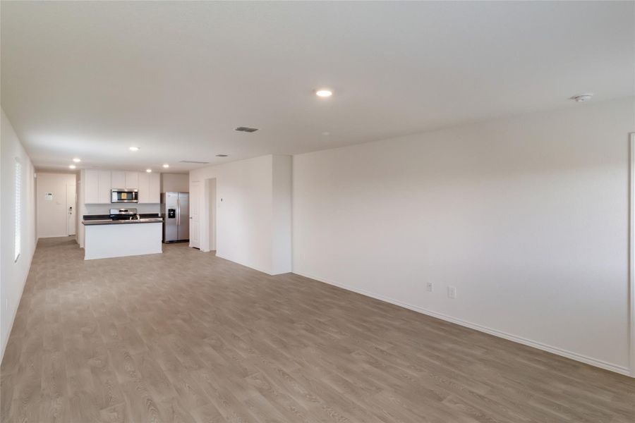 Spacious, unfurnished interior of a new home in Watermill, Uhland (Image 9).