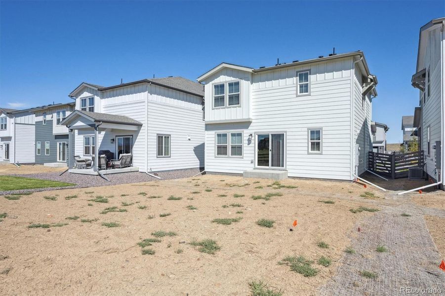 Exterior details and patio area of a home in Legato, Commerce City (Image 16).