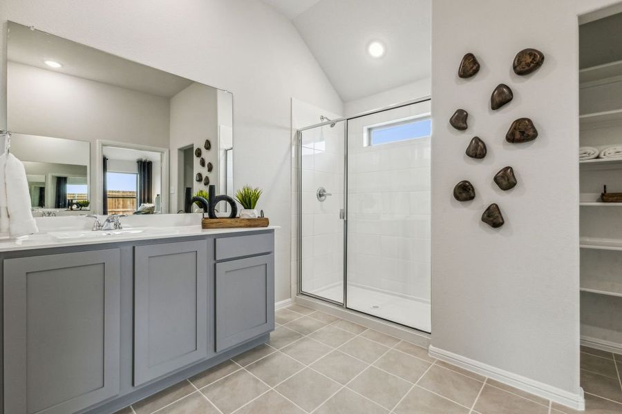 Primary Bathroom in the Turquoise home plan by Trophy Signature Homes – REPRESENTATIVE PHOTO