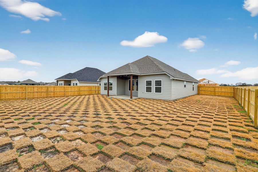 Exterior details and patio area of a home in , Snook (Image 22).
