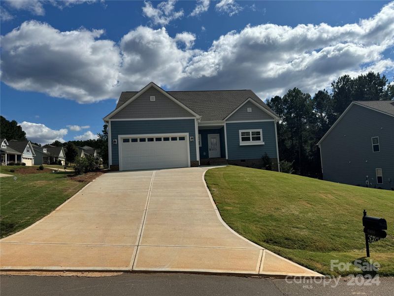 Located in Lakeview Pointe, this new home offers larger lot sizes and a covered rear porch