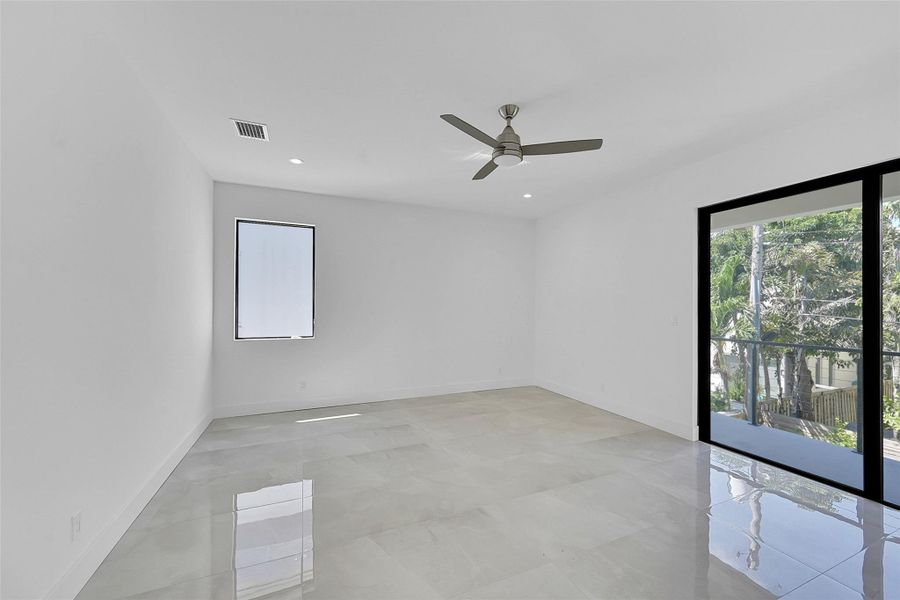 Oversized primary bedroom. With balcony and 2 closets.