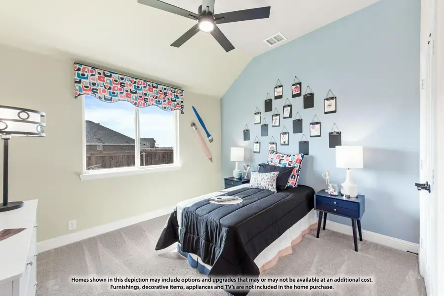 Child's bedroom with vaulted ceiling, ceiling fan, blue accent wall, and carpet flooring Child's bedroom with vaulted ceiling, ceiling fan, blue accent wall, and carpet flooring
