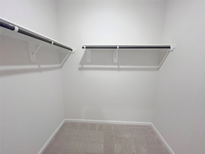 The Robin II- Primary Walk-In Closet. Sample image to be used for example only, colors, options and upgrades vary. The Robin II- Primary Walk-In Closet. Sample image to be used for example only, colors, options and upgrades vary.