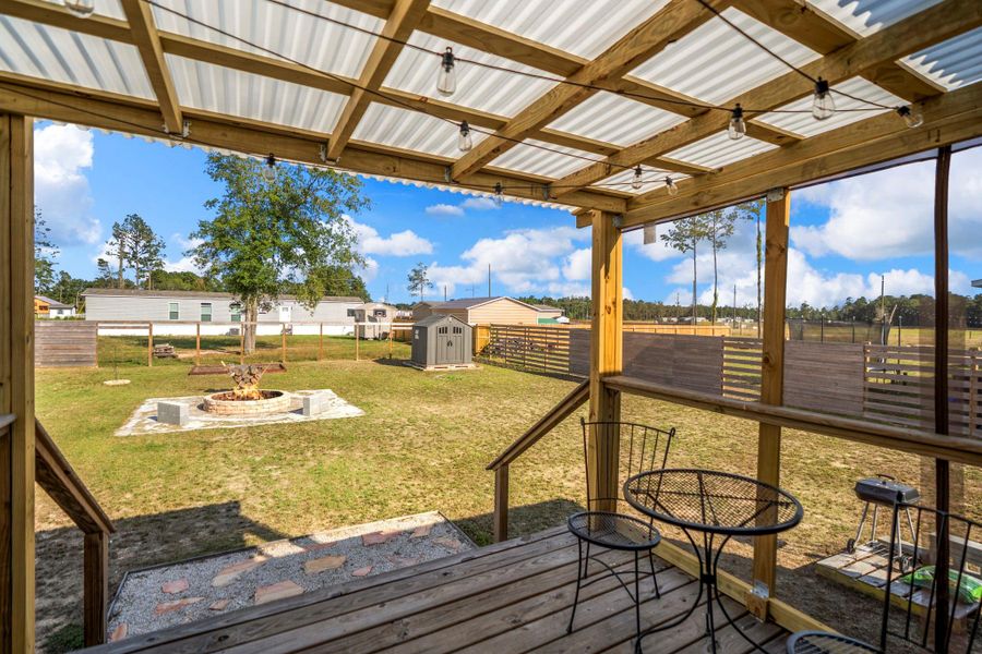 Exterior details and patio area of a home in , Conroe (Image 18).