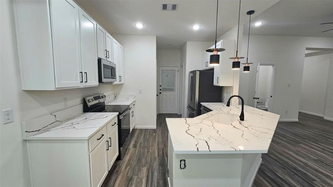 Furnished interior view inside a new home in , Kenefick (Image 11).