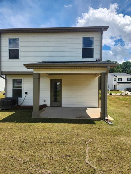 Front exterior of a new home in The Enclave at Stonewall Station, Atlanta, GA, highlighting curb appeal (Image 1). Front exterior of a new home in The Enclave at Stonewall Station, Atlanta, GA, highlighting curb appeal (Image 1).