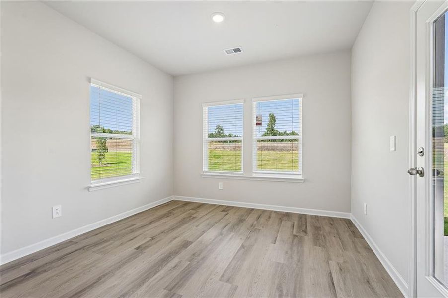 Spacious, unfurnished interior of a new home in Northwoods at Mirror Lake, Villa Rica (Image 42).