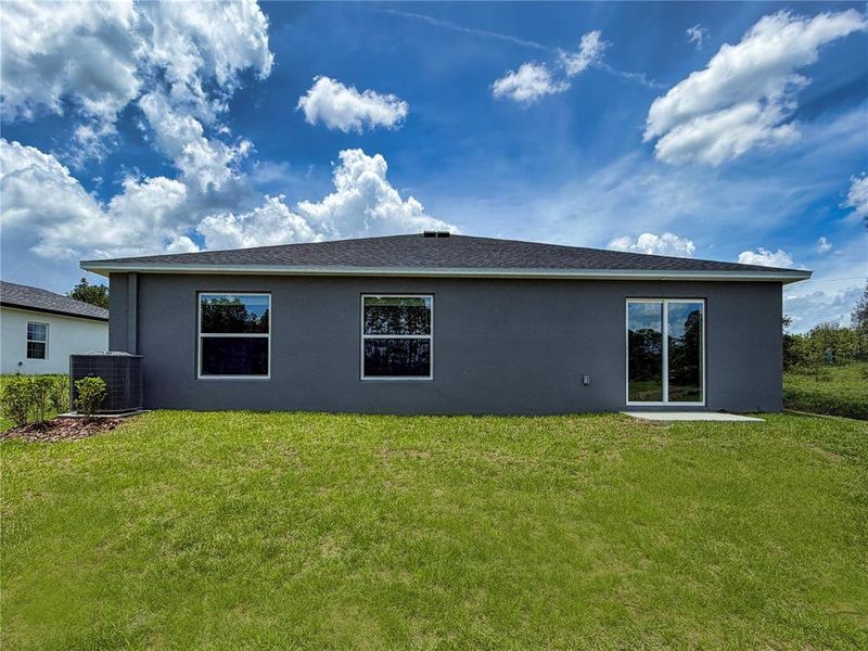 Exterior details and patio area of a home in Marion Oaks, Ocala (Image 3).