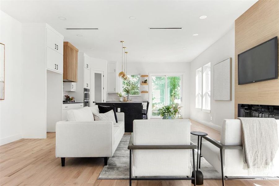 Living room with light wood-type flooring