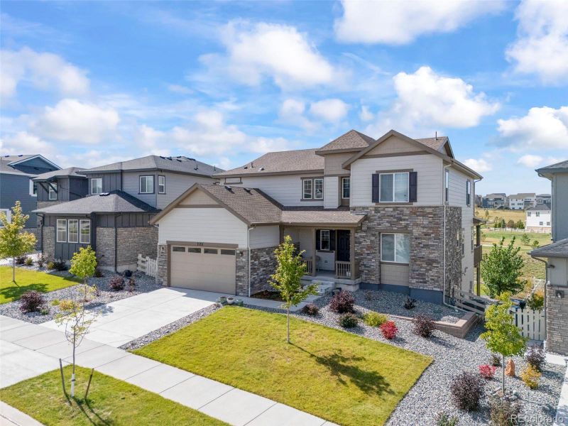 Front exterior of a new home in , Aurora, CO, highlighting curb appeal (Image 2).