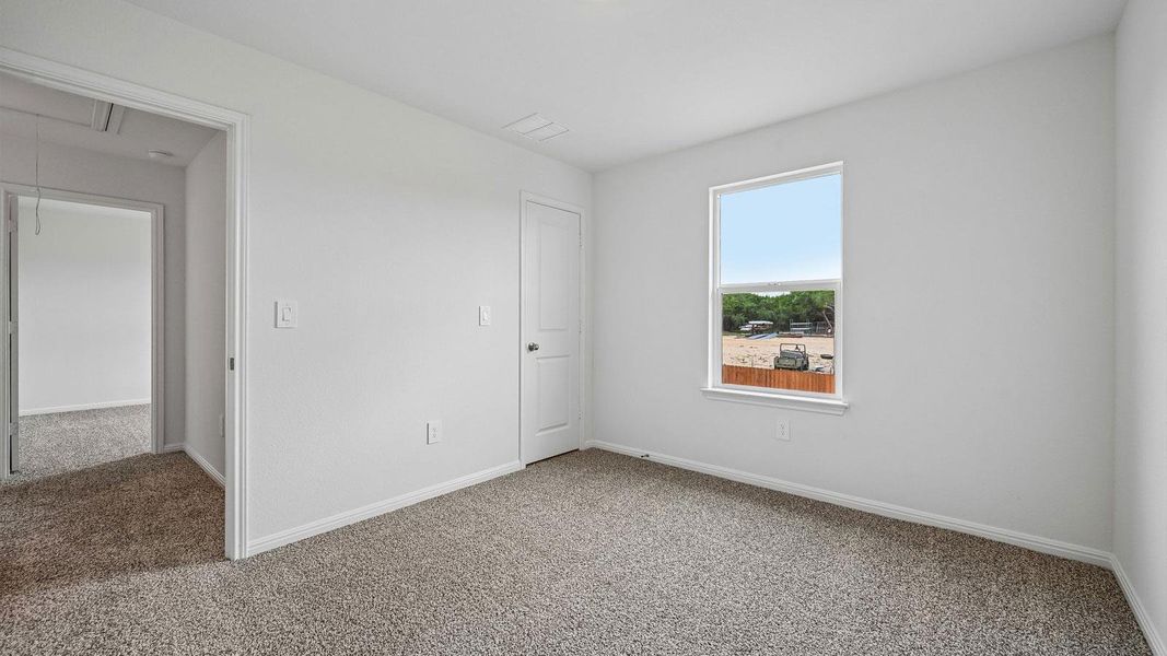 Spacious, unfurnished interior of a new home in Bar W Ranch, Leander (Image 30).