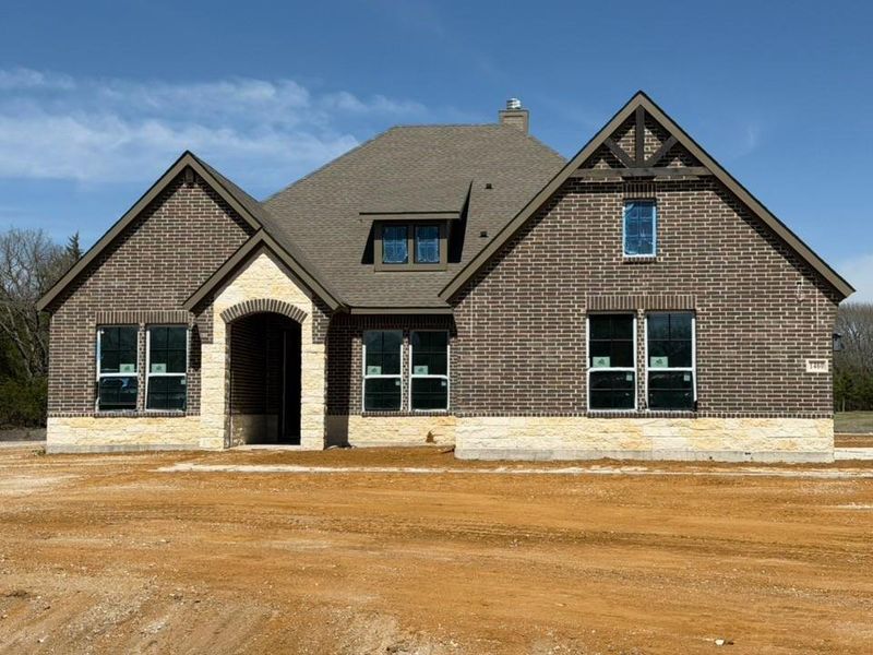 In-progress construction of a new home in King Crossing Estates, Van Alstyne, TX (Image 5).