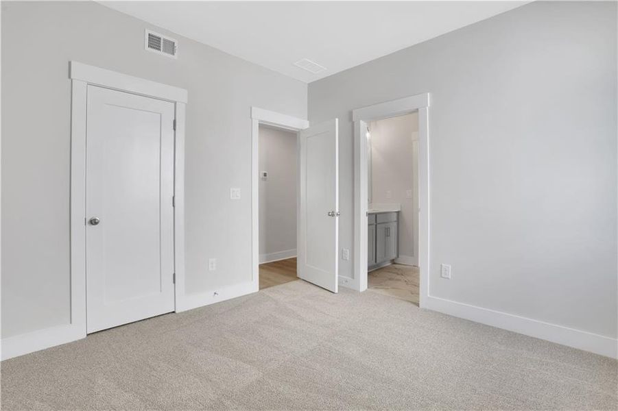 Spacious, unfurnished interior of a new home in The Paddocks at Doc Hughes, Buford (Image 23).