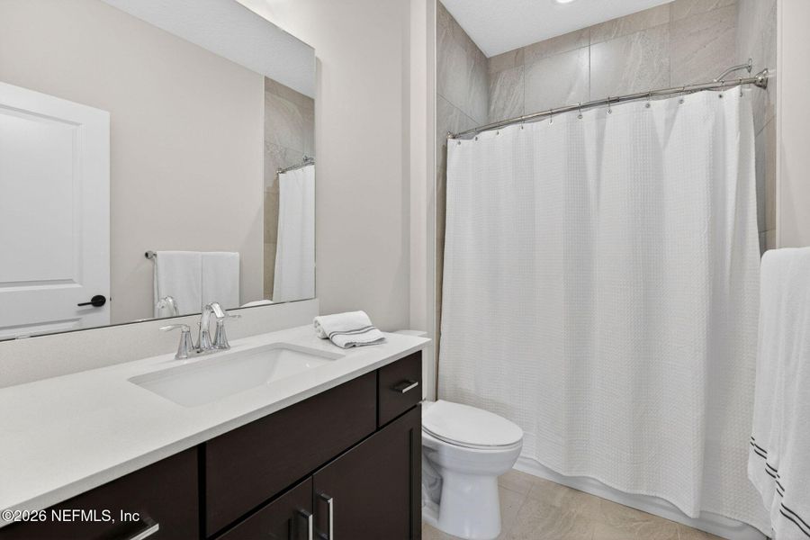 Furnished interior view inside a new home in SilverLeaf, St. Augustine (Image 40).