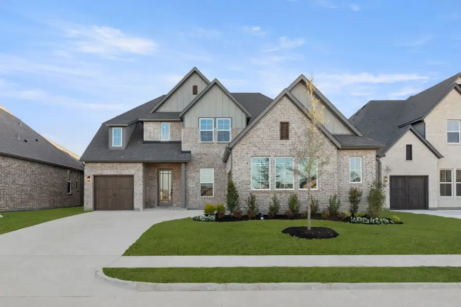 Representative exterior photo of a completed home built from the Edward- 70 ft Home Site by Rockwell Homes in Nelson Lake Estates, Rockwall, TX (Image 29).