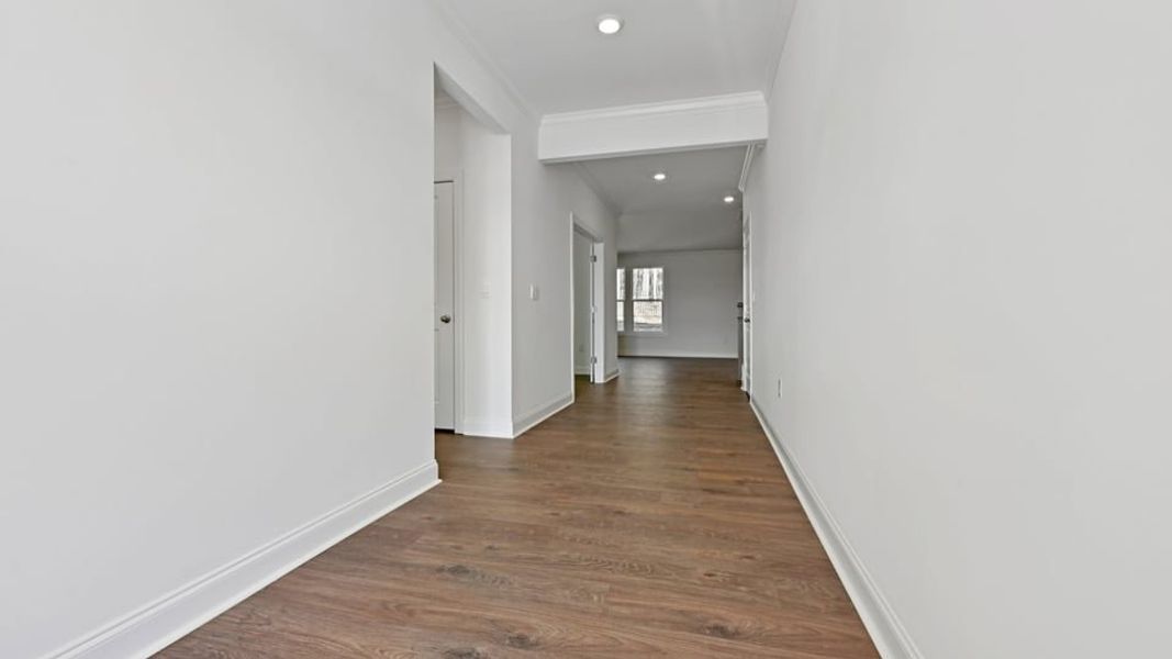 Representative unfurnished interior of a home built from the Wylie by D.R. Horton in Eagle Creek, Fuquay Varina (Image 16).
