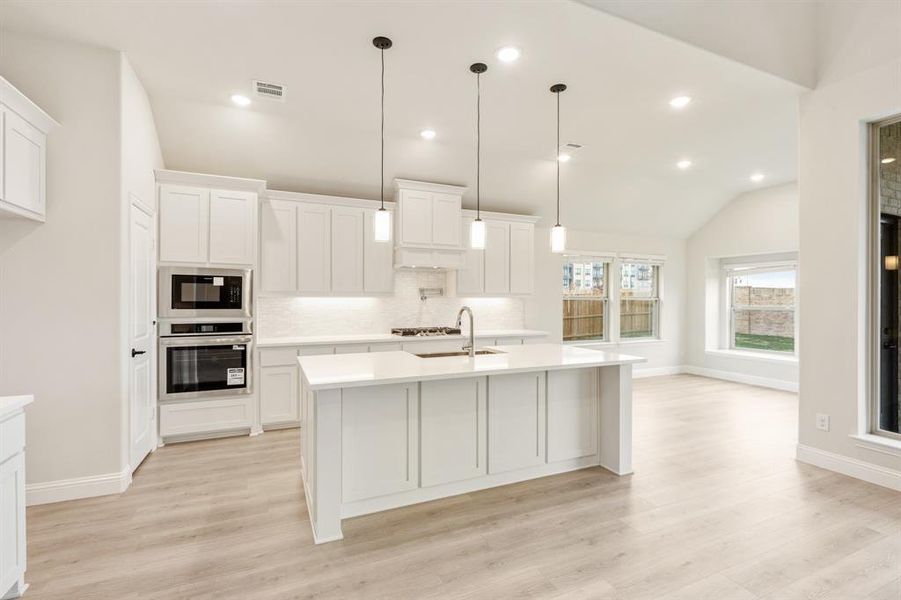 Furnished interior view inside a new home in Villages of Hurricane Creek, Anna (Image 6).