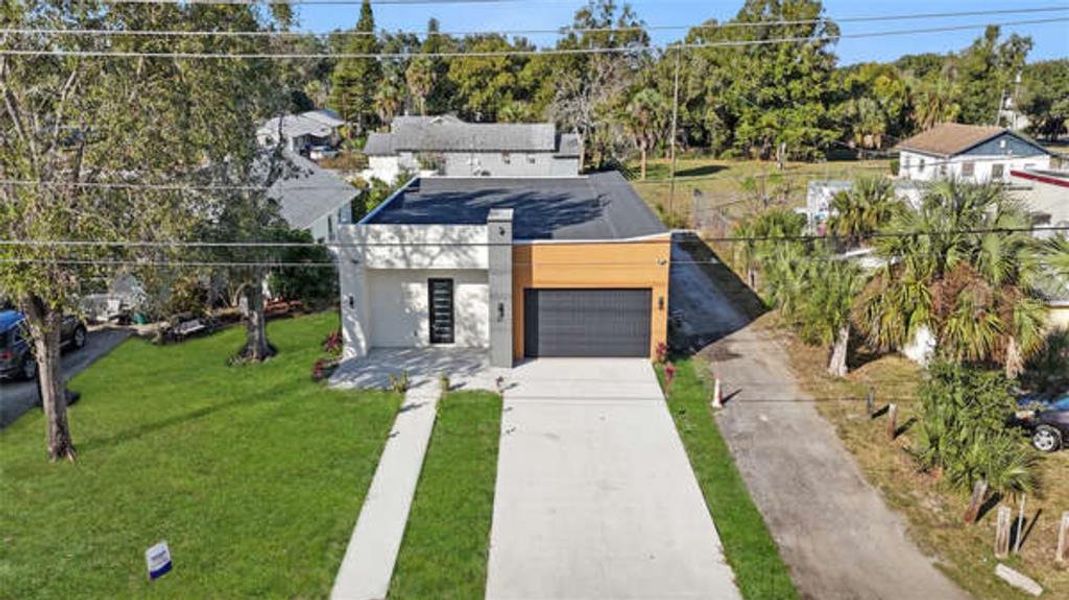 Front exterior of a new home in , Apopka, FL, highlighting curb appeal (Image 18). Front exterior of a new home in , Apopka, FL, highlighting curb appeal (Image 18).