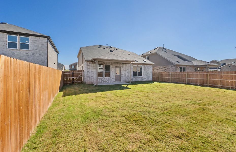 Exterior details and patio area of a home in Lagos, Manor (Image 26).